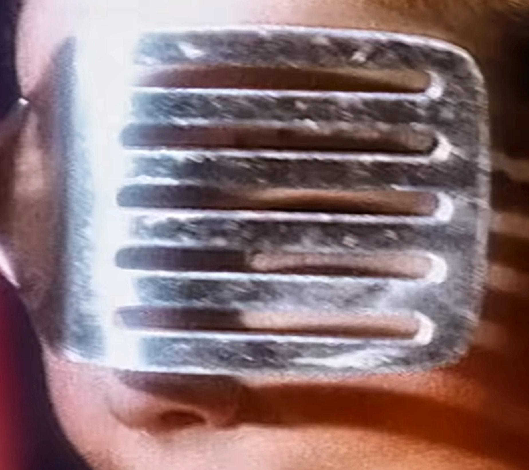 Metal kitchen utensil over an eye — enhanced image