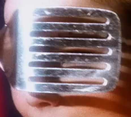 Metal kitchen utensil over an eye — original image